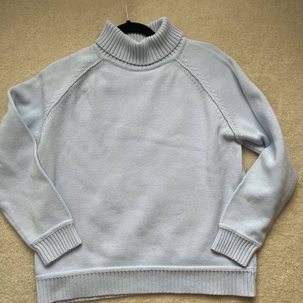 light blue turtle neck sweater